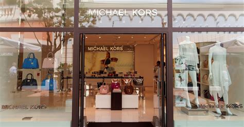 Michael Kors to close 100 to 125 stores 